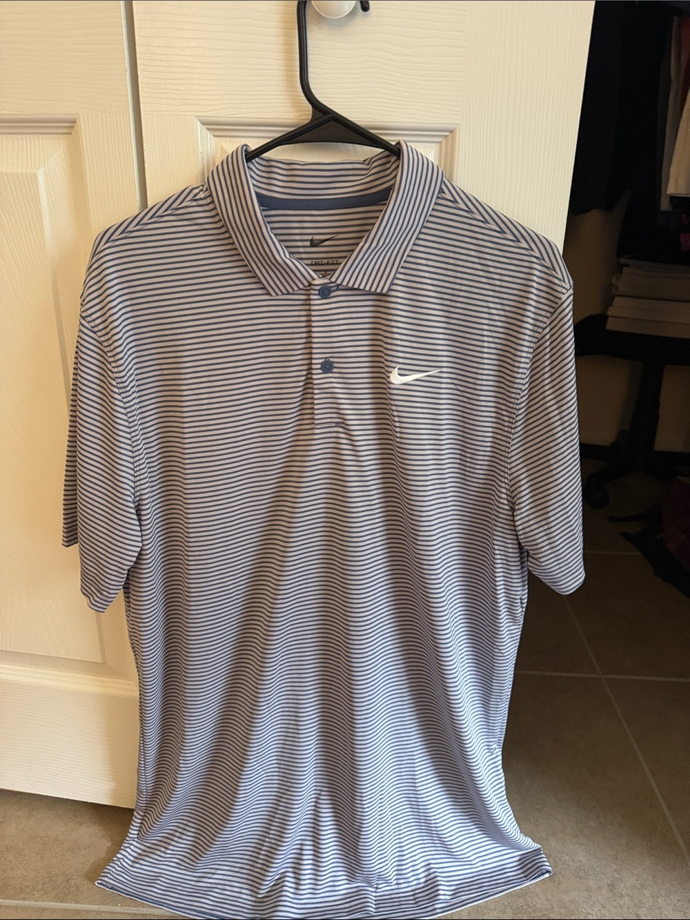 Nike Men's Navy and White Striped Polo